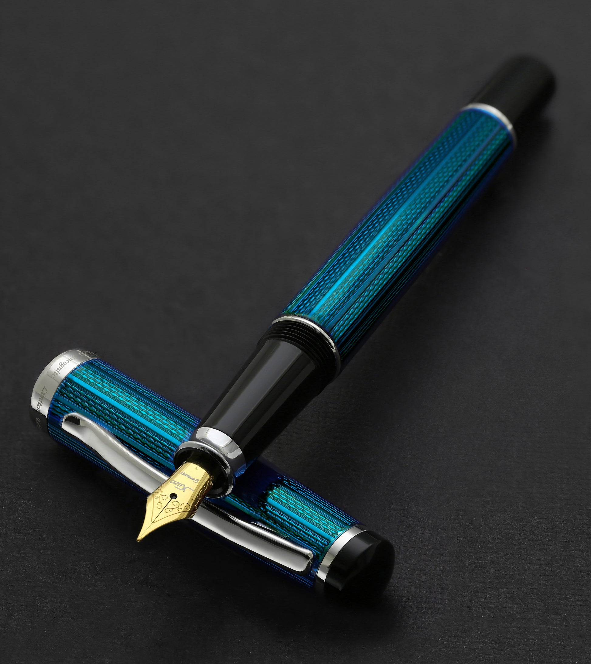 Xezo - Incognito Blue FM fountain pen resting on cap