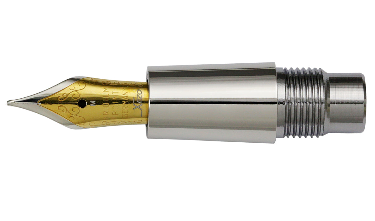 Xezo - Front view of the Medium Fountain Nib with gold-plated body, stainless steel tines, and platinum-plated grip section. Compatible with Maestro 925 Sterling Silver and Incognito 925 Sterling Silver fountain pens. The body of the nib has motif patterns.