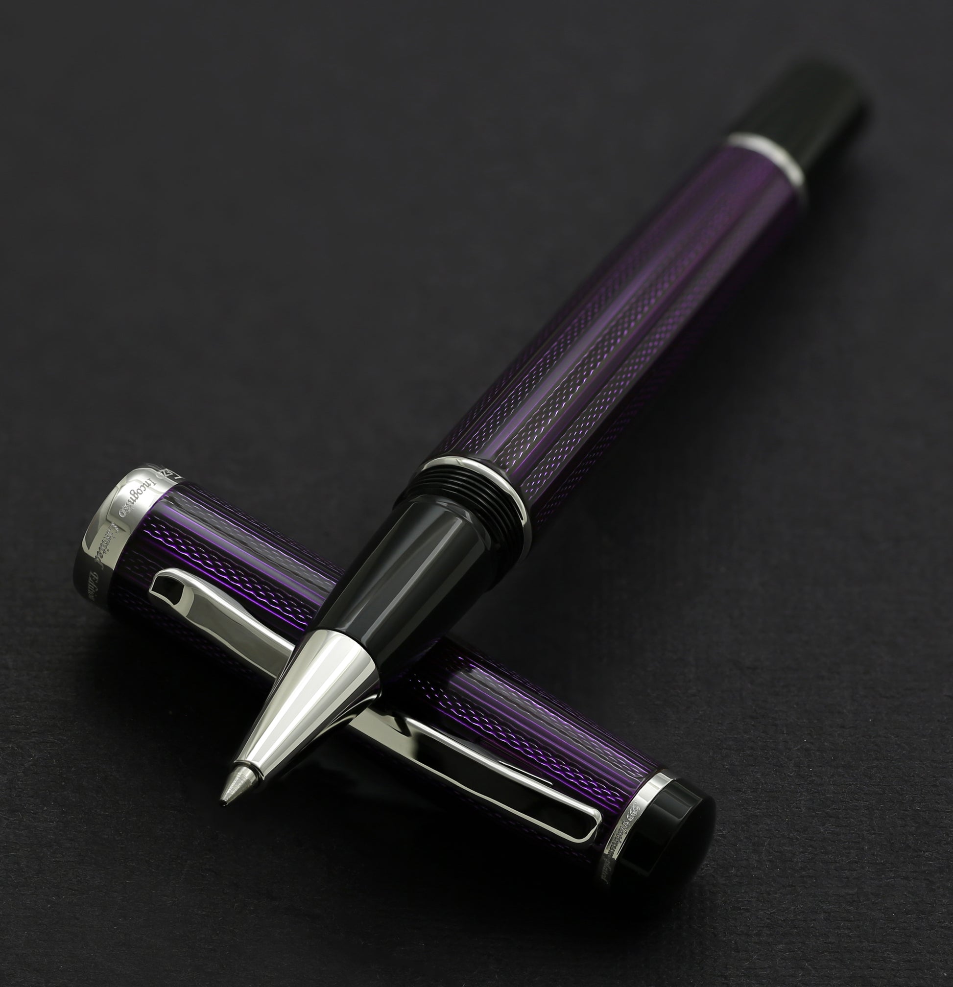 Xezo - Incognito Purple R rollerball pen resting on its cap