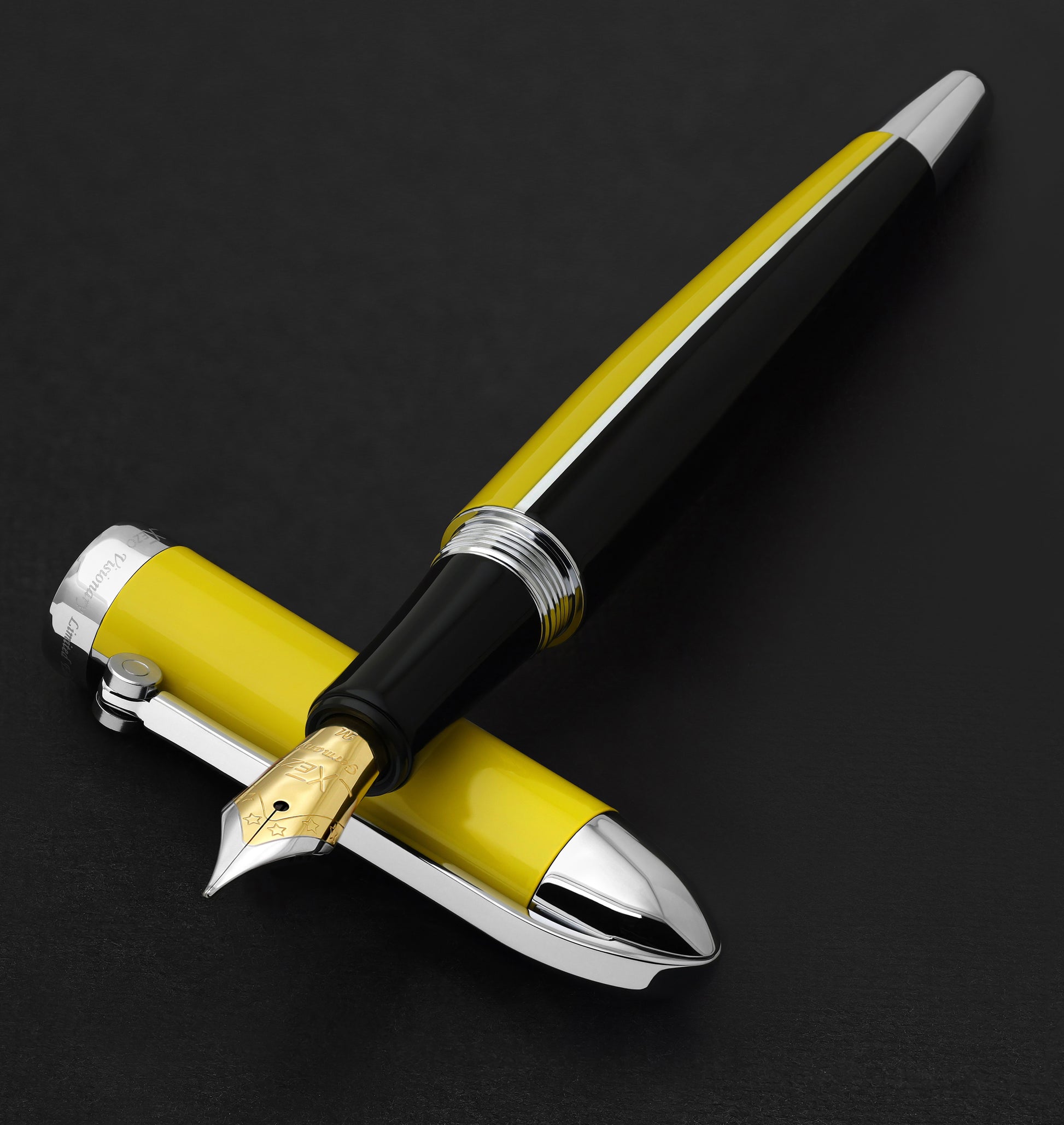 Xezo - Visionary Speed Yellow/Black FM Fountain pen resting on its cap