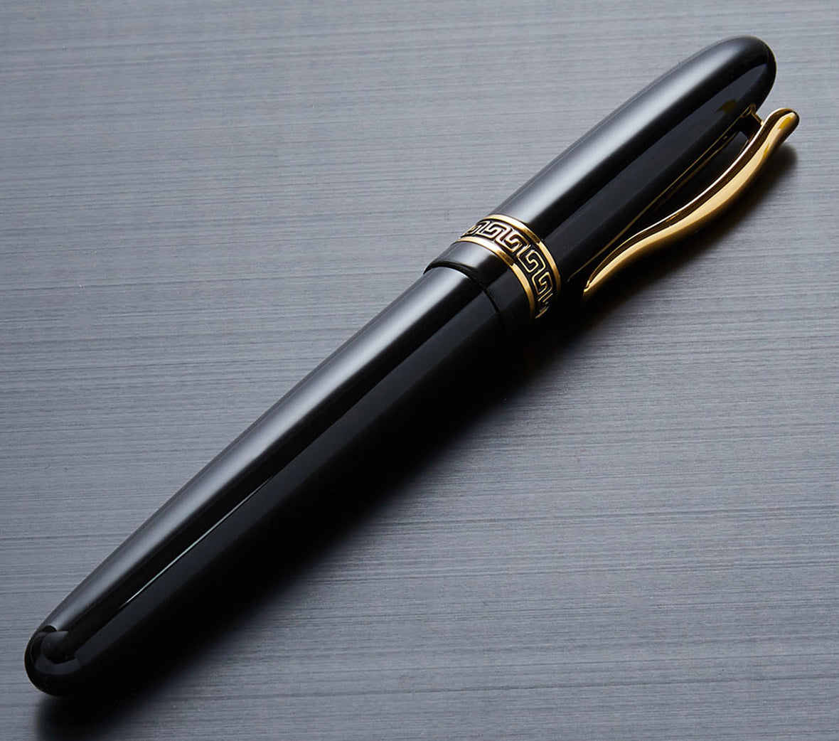 Xezo - Side view of a capped Phantom Classic Black R rollerball pen
