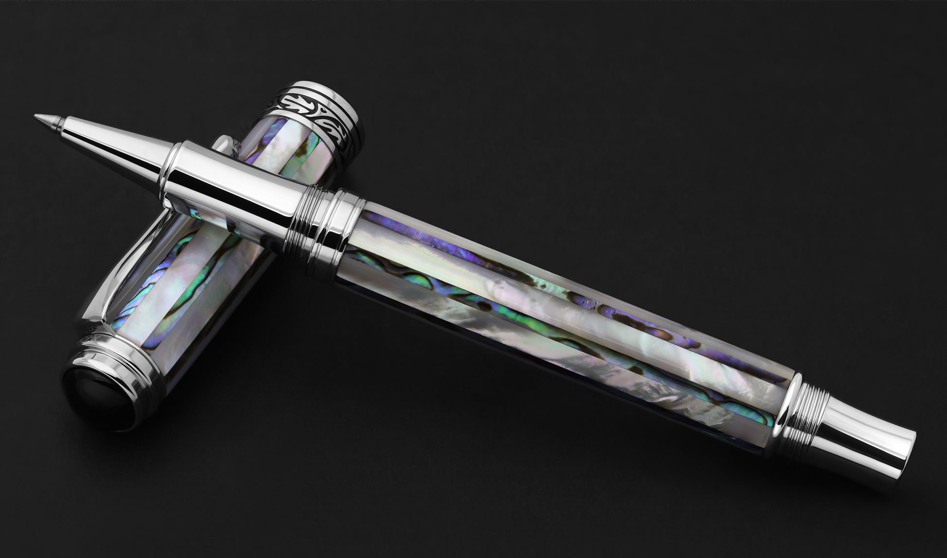 Maestro Jubilee mother-of-pearl Abalone rollerball pen uncaped laid down horizontally