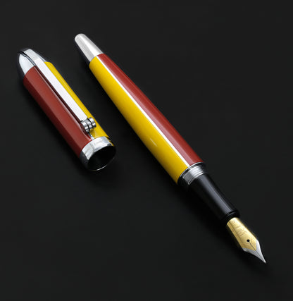 Xezo - Front view of an uncapped Visionary Aspen/Red FM fountain pen with its cap next to it
