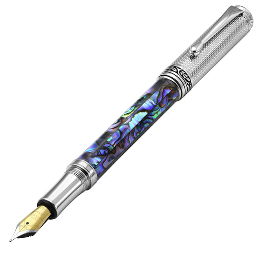 Xezo - Angled front view of the Maestro Paua Abalone Chrome FM fountain pen, with the cap posted on the end of the barrel