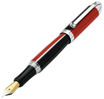 Xezo - Angled front view of the Visionary Red/Black F fountain pen, with the cap posted on the end of the barrel