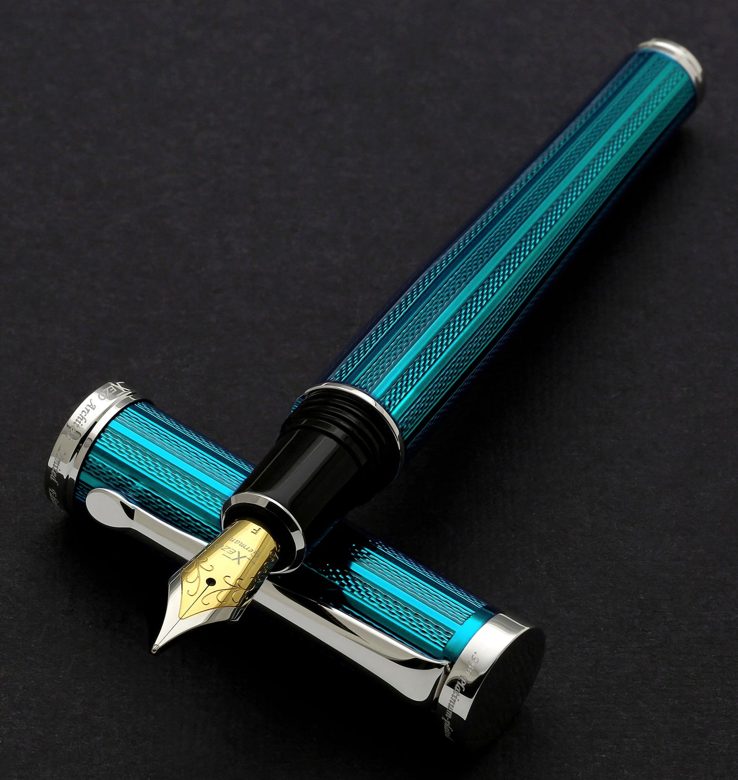 Xezo - Architect Azure Blue F-2 fountain pen resting on cap