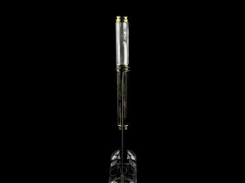 Xezo - A Maestro Tahitian Black MOP R Rollerball pen standing on a turning pen stand
