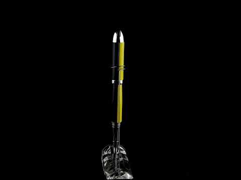 Xezo - A Visionary Speed Yellow/Black R Rollerball pen standing on a turning pen stand