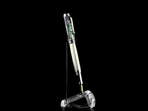 Xezo - A Maestro 925 BL MOP FM Fountain pen standing on a turning pen stand