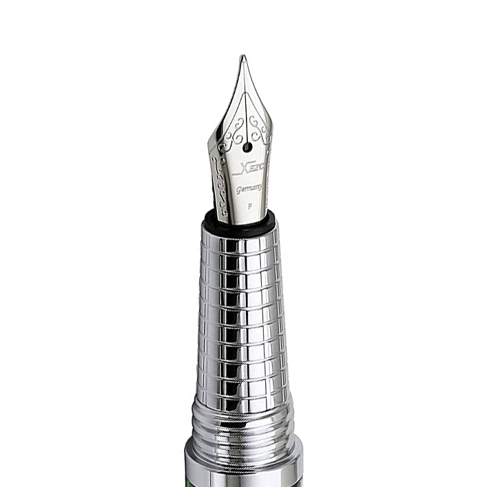 Xezo – Angled view of the front of a Fine Fountain Nib – with stainless steel body and grip – Compatible with  Urbanite II fountain pen series. The body of the nib has motif patterns.